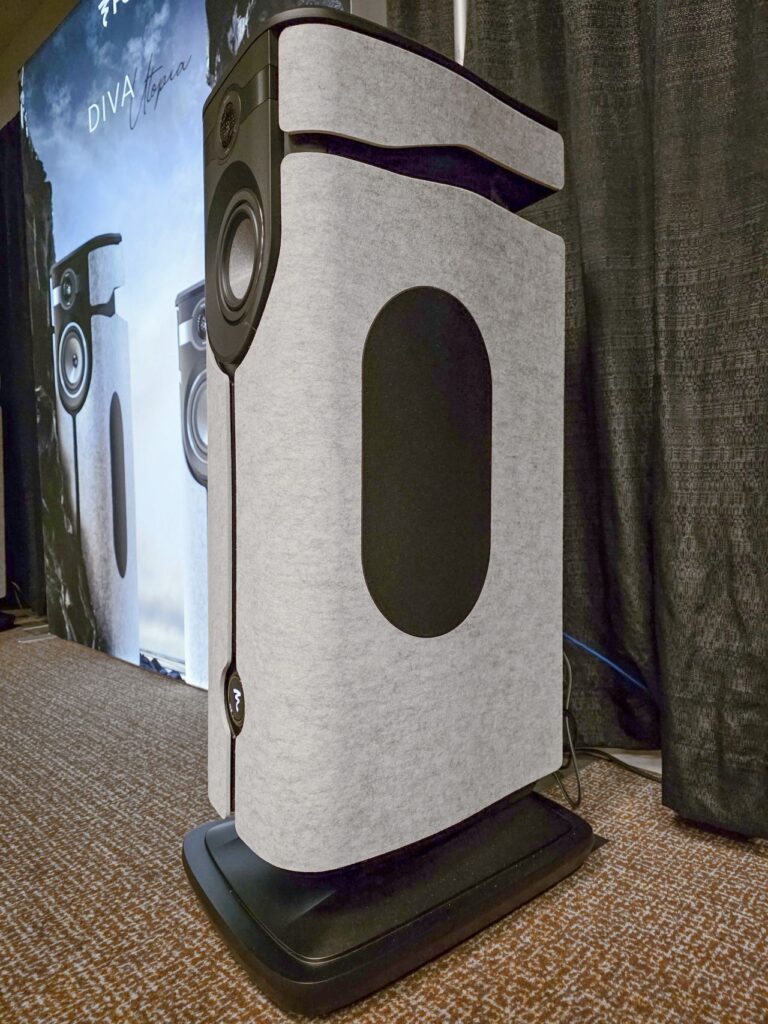 Full-size standing speaker with gray and black trim.
