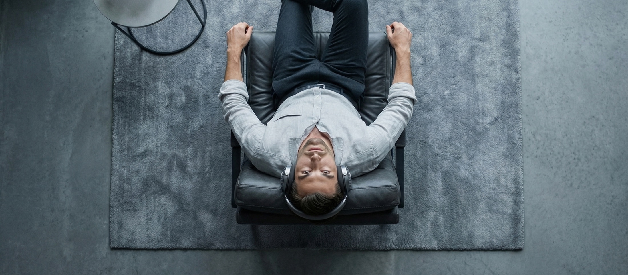 Focal Bathys MG Graphen Grey headphones worn in a lifestyle setting