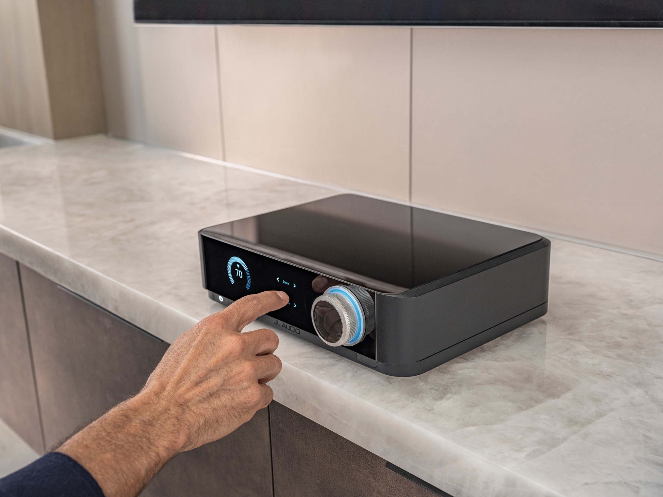 JL Audio Primacy CS Centerpiece touchscreen control hub on a cabinet