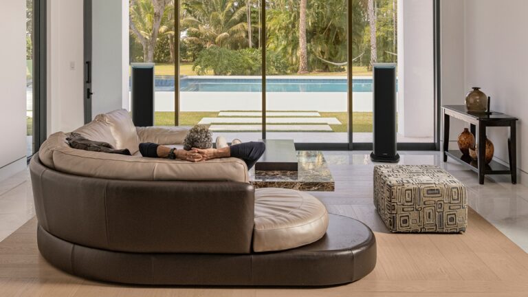 JL Audio Primacy active speaker system with T6 towers in a modern living room