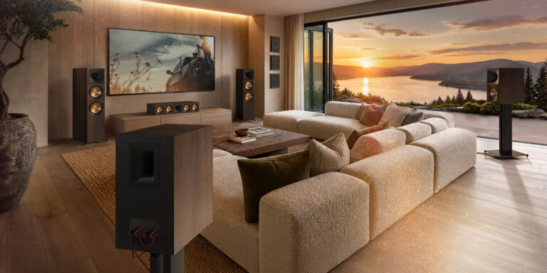 Klipsch Reference Premiere III speakers in Walnut arranged in a modern living room
