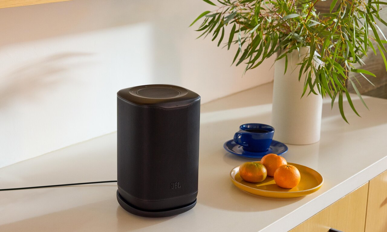 JBL Cove P1 portable wireless speaker in a home setting