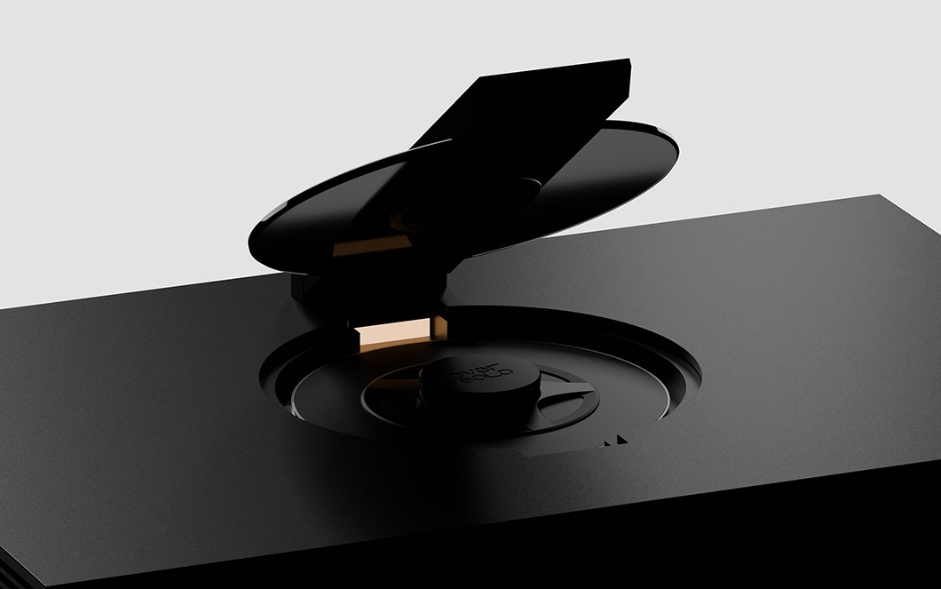 Top-down view of the Eversolo DMP-A8 Master Gen 2 showing a compact disc seated in the top-loading CD mechanism under a smoked glass lid