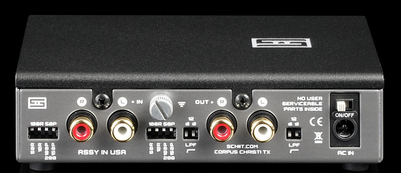 Rear panel view of the Schiit Mani 3 phono preamplifier showing gold-plated RCA input and output jacks, ground terminal, custom loading and LPF DIP switches, power switch, and 16VAC input